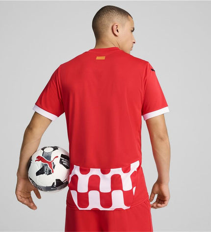 Puma Girona Home football jersey replica with team crest and red and white stripes, designed for sports and outdoor activities.