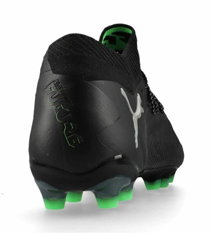 Adult Puma Future 8 Ultimate AG football boots for outdoor soccer, showing black and white design with synthetic upper.