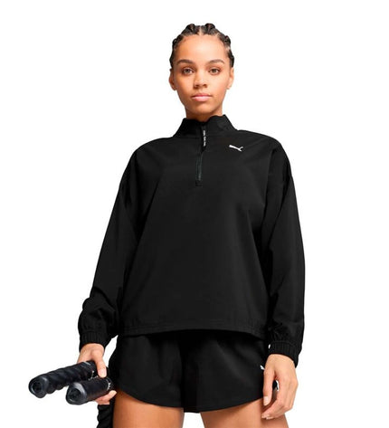 Puma W Strong Woven women's sport jacket in black, lightweight outdoor sportswear with breathable fabric and sporty design.
