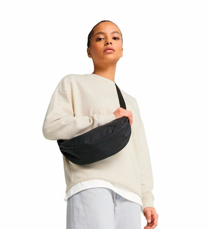 Puma black waist bag, sport and outdoor accessory, designed for camping and hiking, with a sleek compact look.
