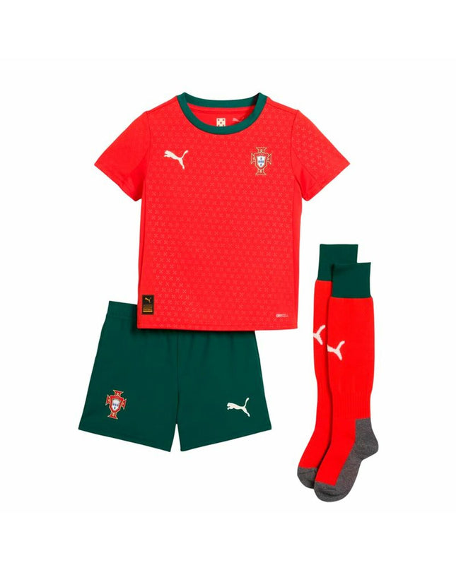 Kids’ Puma Portugal Home Minikit jogging suit in red for football, featuring team logo and sporty design.