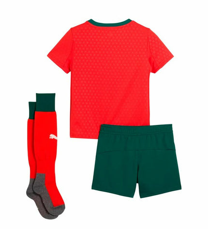 Kids' Puma Portugal Home Minikit jogging suit in red, featuring the football team's logo and sporty design for outdoor activities.