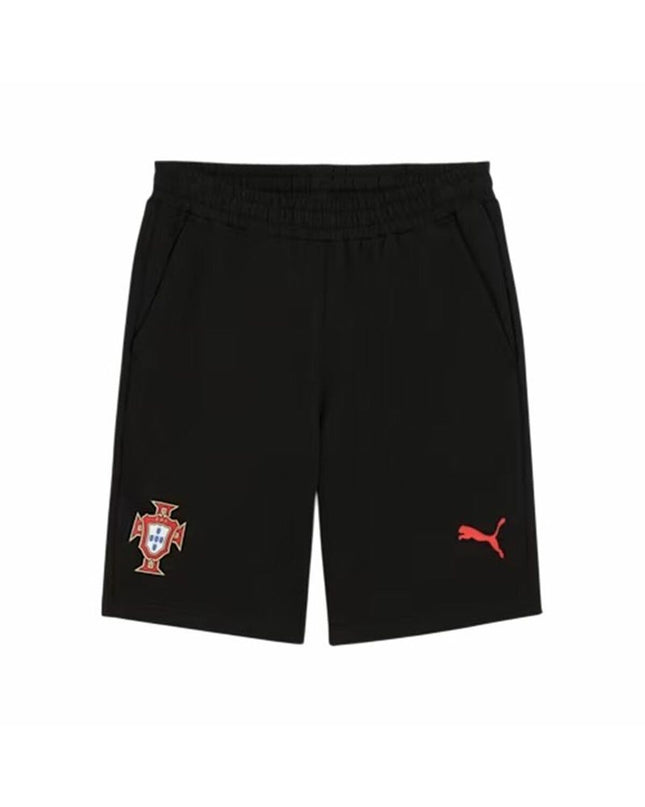 Puma Fpf Ftblnrgy sports football shorts in black with Puma logo, designed for outdoor and soccer activities.