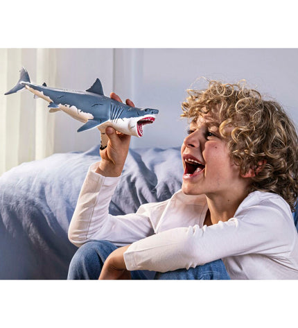 Schleich Megalodon action figure, detailed plastic toy representing a prehistoric shark in a dynamic pose.