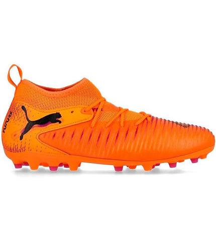 Puma Future 8 Match Mg Heat Fire football shoes for kids, black with orange accents, designed for outdoor soccer.