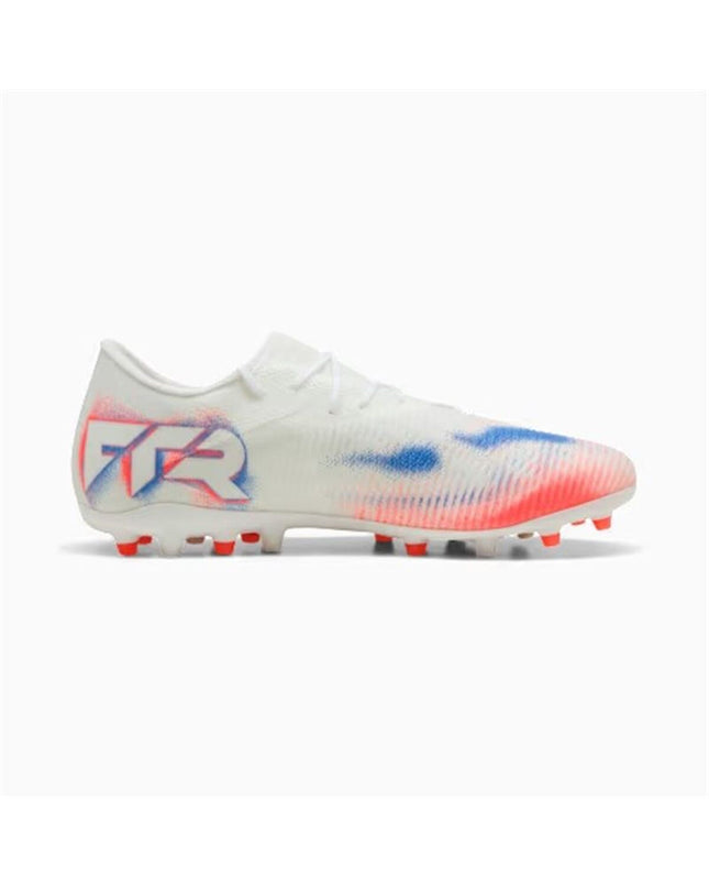 Puma Future 8 Match Low adult football shoes in black with white accents, designed for outdoor soccer performance.