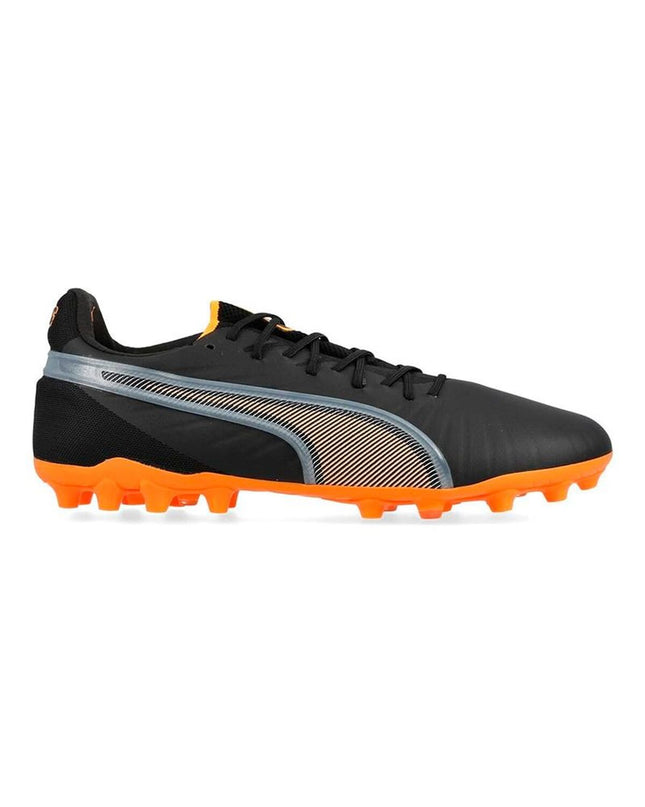 Black Puma King Ultimate MG adult soccer cleats designed for outdoor football, featuring durable construction and lightweight grip.