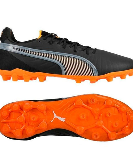 Black Puma King Ultimate MG adult football shoes with synthetic upper and sole, designed for outdoor soccer play.