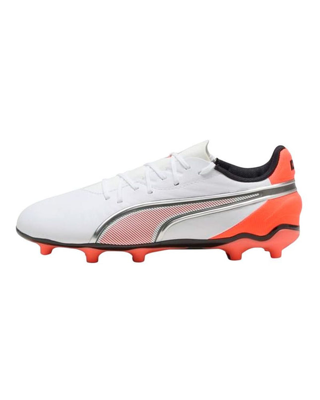 Puma King Match FG/AG football boots with leather upper and rubber outsole, designed for outdoor and indoor soccer play.