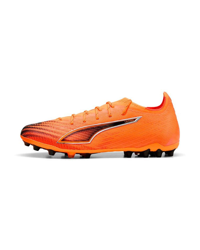 Puma Ultra 6 Ultimate MG Heat Fire B orange adult football cleats for outdoor soccer, featuring lightweight design and grip soles.