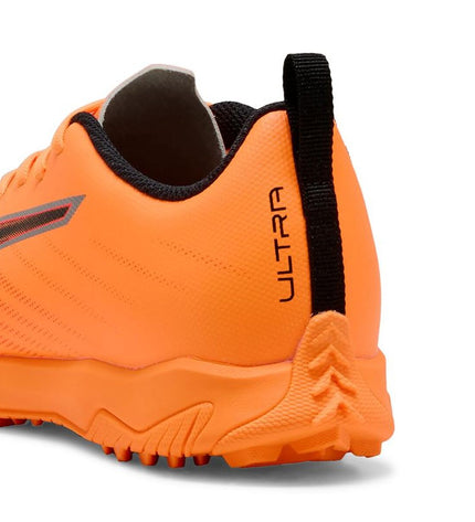 Puma Ultra 6 Play Tt Heat Fire-B soccer cleats for kids, black and red sport shoes designed for outdoor football matches.