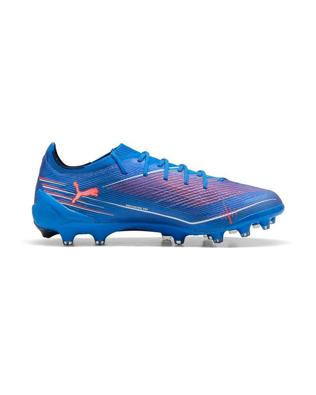 Blue Puma Ultra 6 Ultimate AG adult soccer cleats for outdoor football, featuring sleek design and lightweight performance.