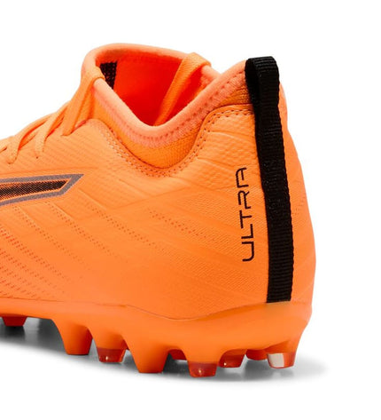 Puma Ultra 6 Match Mg Heat Fire soccer cleats for kids, designed for outdoor football, featuring heat-inspired fiery orange details.