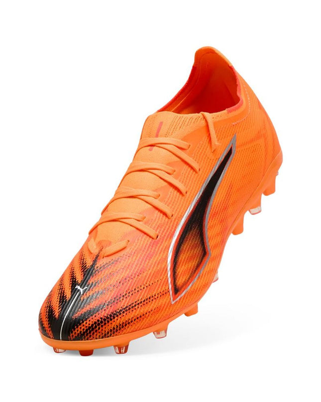 Puma Ultra 6 Match MG adult soccer cleats in black with white Puma logo, designed for outdoor football matches.