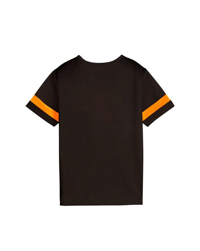 Children's Puma soccer shorts with short sleeves, suitable for ages 11-12, in a sporty outdoor football setting.