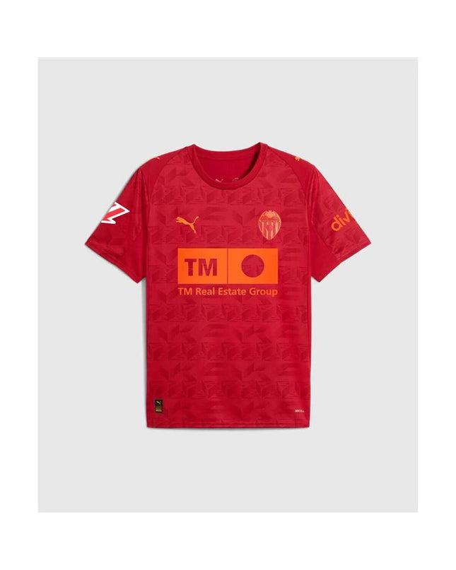 Red Puma kids' soccer jersey with short sleeves for ages 5-6, designed for sport and outdoor activities.