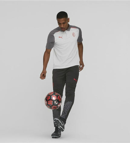 Adult Puma football training pants in black with Puma logo, designed for sport and outdoor football activities.
