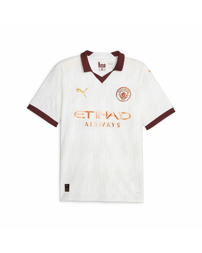 Puma Manchester City away men's short-sleeve football T-shirt, sports jersey with team logo and blue design.