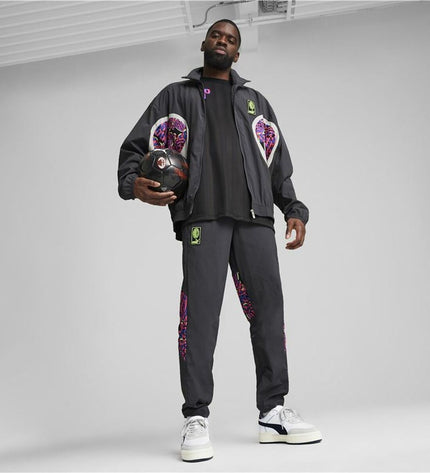 Dark gray Puma AC Milan adult training tracksuit for soccer, sports and outdoor activities, featuring woven fabric and branding details.