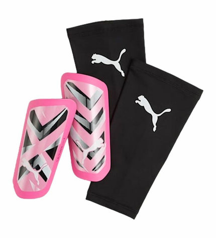 Pink Puma ULTRA Light football shin guards for sport and outdoor soccer, padded protection for lower legs.