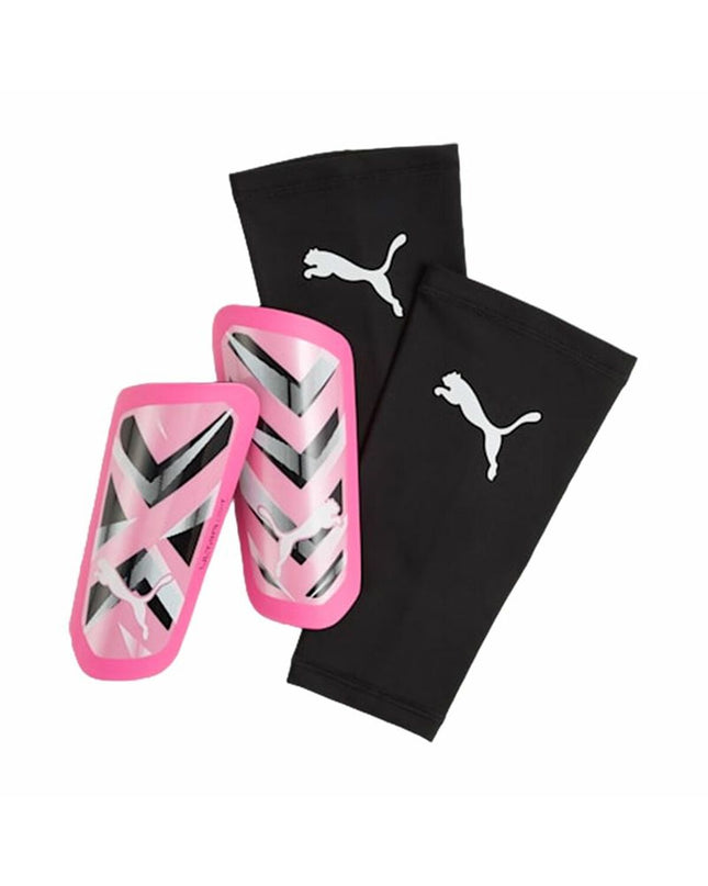Pink Puma ULTRA Light football shin guards for sport and outdoor soccer, padded protection for lower legs.