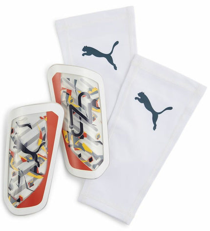 Puma Neymar Ultra Flex football shin guards with black straps and padding, designed for sport and outdoor soccer.