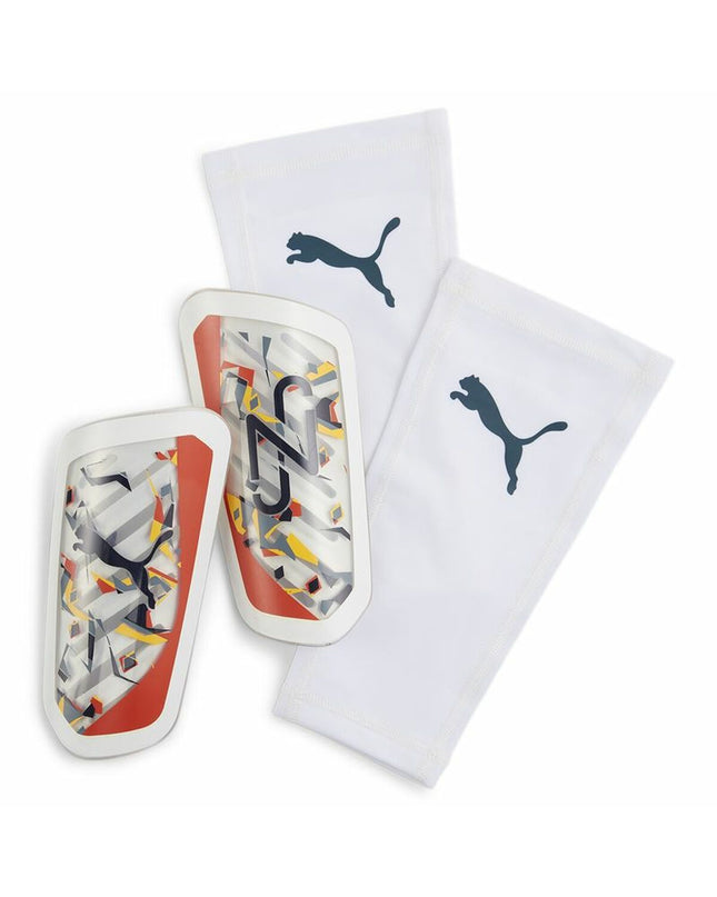 Puma Neymar Ultra Flex football shin guards with black straps and padding, designed for sport and outdoor soccer.