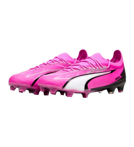 Pink Puma Ultra Ultimate FG/AG adult football cleats for sport and outdoor play, featuring a sleek design with textured details.