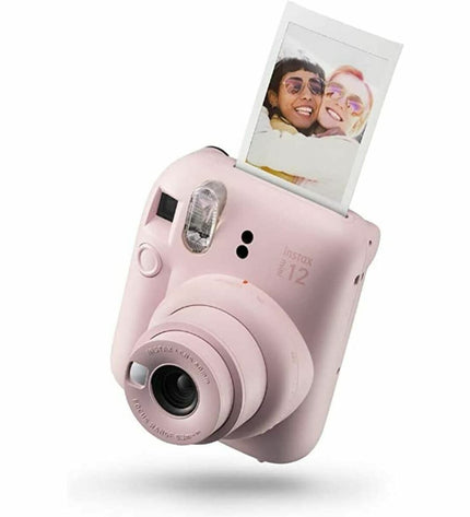 Fujifilm Mini 12 instant camera in pink, compact electronic camera for photography and instant photos.