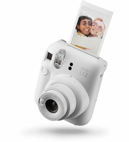 Fujifilm Mini 12 instant camera in white with lens and viewfinder, ready for instant photo capturing.