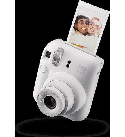 Fujifilm Mini 12 instant camera in white with compact design, ready for instant photo printing.