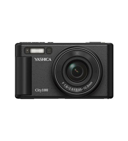 Yashica YAS-DGC100-BK compact digital camera with black body, electronic photography features, and lens in close-up view.