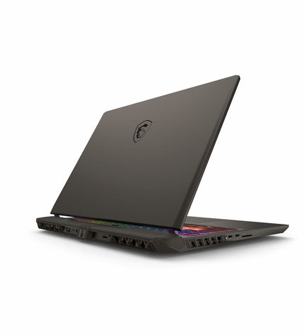 MSI VECTOR 16 HX AI laptop with 16-inch display and 32 GB RAM, shown from a side angle highlighting the sleek design.