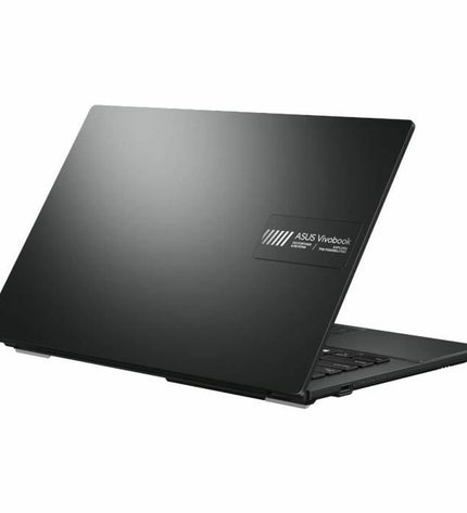 Asus VivoBook 14 S1404 laptop with 14-inch display, 16GB RAM, and 512GB SSD, showing the keyboard and screen.