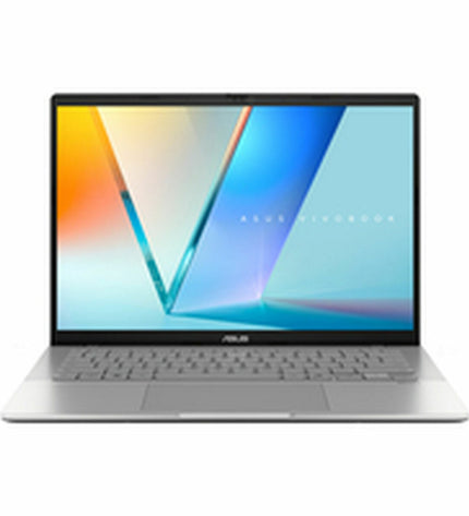 Asus VivoBook S14 laptop with 14-inch display, Intel Core i5, 16GB RAM, 1TB SSD, QWERTY Spanish keyboard, sleek design.
