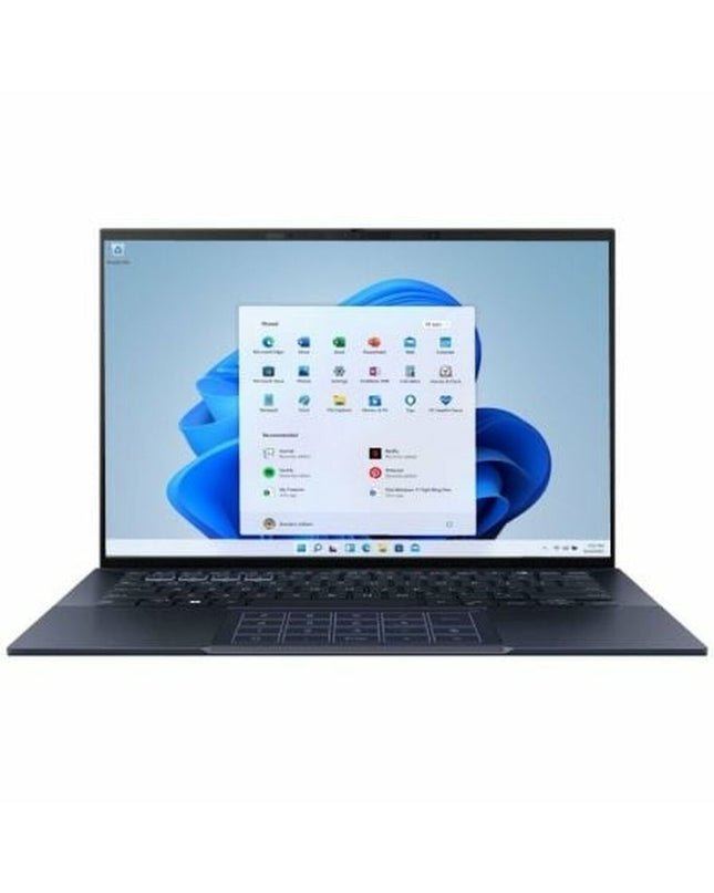 Asus ExpertBook B9 OLED laptop with 14-inch display, 16GB RAM, 512GB SSD, Intel Core i5, sleek design and lightweight build.