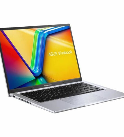Asus laptop with sleek design and keyboard, shown for calculation or computing tasks, featuring a modern display and branding.