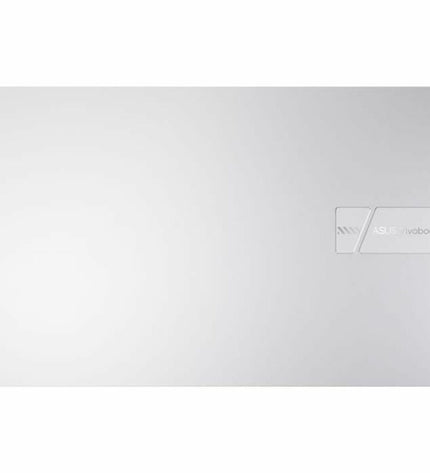 Asus laptop with 16GB RAM and 512GB SSD, showing the AZERTY keyboard layout and sleek design.