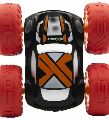 Exost police car toy on remote control with flashing lights, designed for children, in a playful scene.