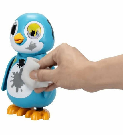 Silverlit Rescue Penguin robot toy with silver finish, featuring electronic components and animated features.