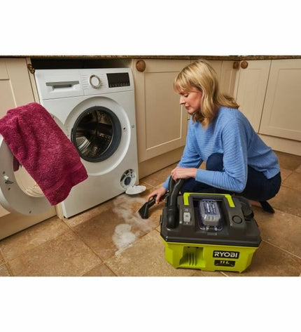 Ryobi 18V cordless vacuum cleaner for home cleaning, showing the compact handheld design with dust container and power controls.