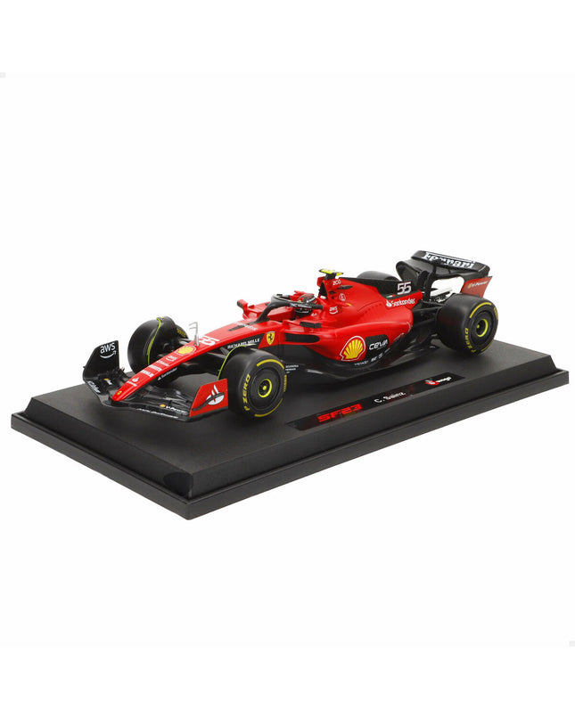 Bburago Ferrari F1 SF23 #55 racing car toy model in 1:18 scale, detailed replica with red and black paint, placed on a white background.