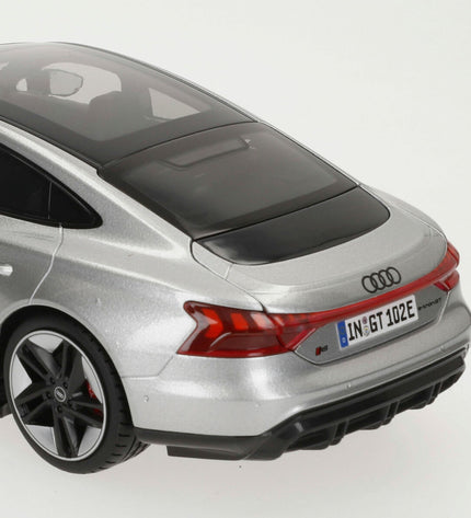Bburago Audi RS E-TRON GT 2022 1:18 scale toy car, detailed miniature vehicle for play and collection.