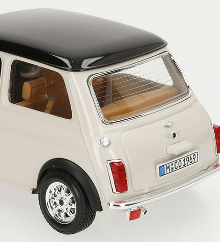 Bburago 1:18 scale GT-Mini Cooper toy car from 1969, detailed model in red with black racing stripes and realistic features.