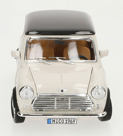 Bburago 1:18 scale GT-Mini Cooper toy car from 1969, detailed miniature vehicle in gray with black and white accents.