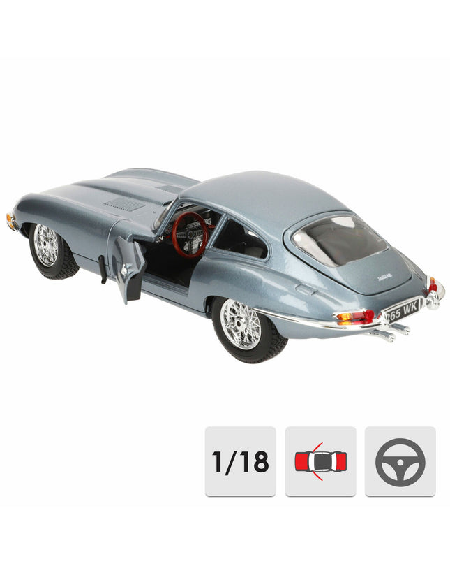 Bburago 1:18 scale GT-Jaguar "E" Coupe toy car from 1961, detailed model with sleek silver finish and realistic features.