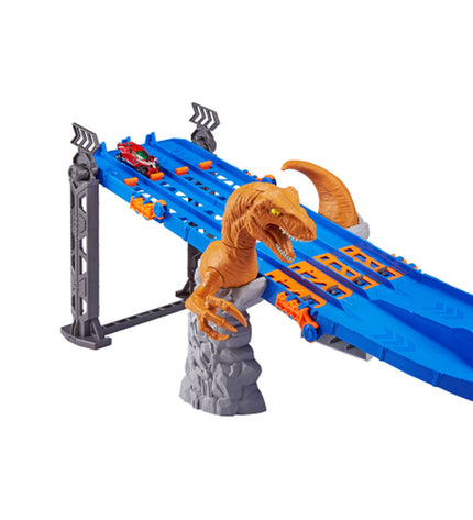 Zuru Metal Machines Racebaan Raptor Attack toy track with four lanes, featuring colorful cars on a detailed racing circuit.
