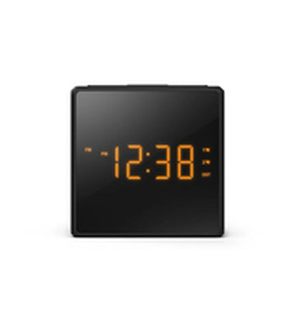 Philips TAR4500/10 radio alarm clock with digital display and control buttons, set on a white surface.