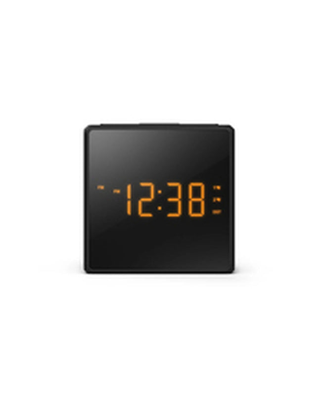 Philips TAR4500/10 radio alarm clock with digital display and control buttons, set on a white surface.