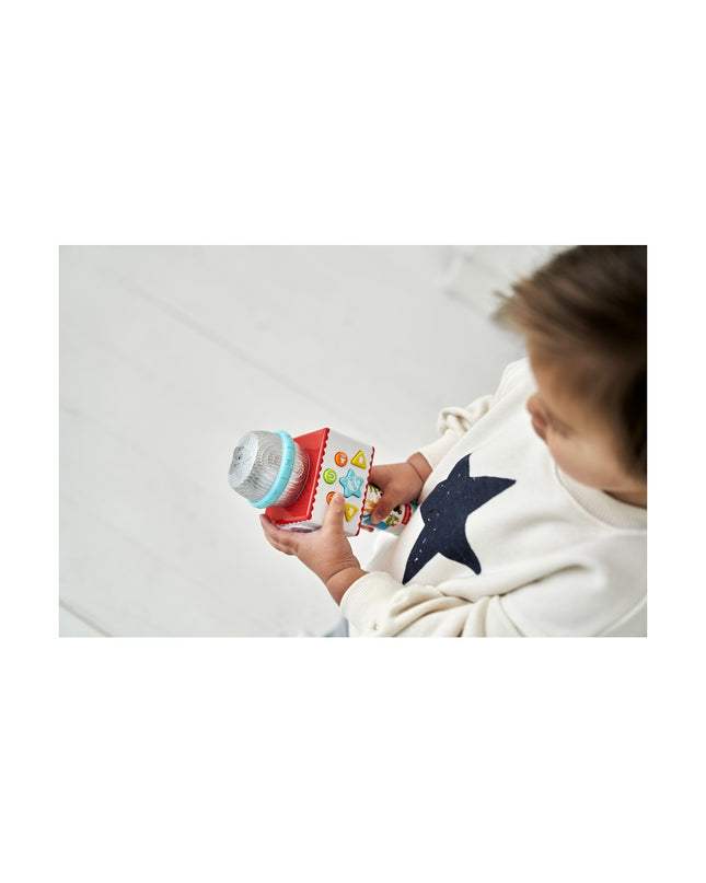 Fisher-Price karaoke microphone toy featuring colorful animal designs, ideal for children's musical play and singing activities.
